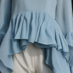 Elegant Sky Blue Peplum Blouse With Tiered Ruffle Hem And Flared Sleeves