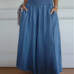 Jasper | High-waisted smocked trousers