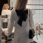 Dance All Night Sequin Back Tie Up Bow Loose Mini Dress