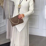 Jensine Ribbed Knit Long Sleeve Irregular Hem Loose Sweater