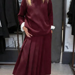 Women's Solid Color Stand-collar Long-sleeved Loose-fitting Knitted Top And High-waisted Loose A-line Skirt Set.