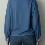 Women's Round Neck Metal Eyelet Cutout Design Casual Loose Long-sleeved Denim Top.