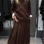 Women's Solid Color Stand-collar Long-sleeved Loose-fitting Knitted Top And High-waisted Loose A-line Skirt Set.