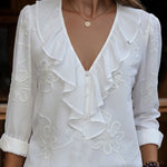 Vintage ruffled V-neck shirt with embroidered flowers
