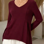 Women's Solid Color V-neck Long-sleeved Casual Loose-fitting Top With Irregular Hem.
