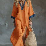 Loose And Cozy Patchwork Denim Dress With Contrasting Trim.
