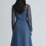 A Stylish Denim Dress With Mesh Sleeve Paneling.