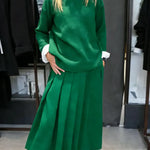 Women's Solid Color Stand-collar Long-sleeved Loose-fitting Knitted Top And High-waisted Loose A-line Skirt Set.